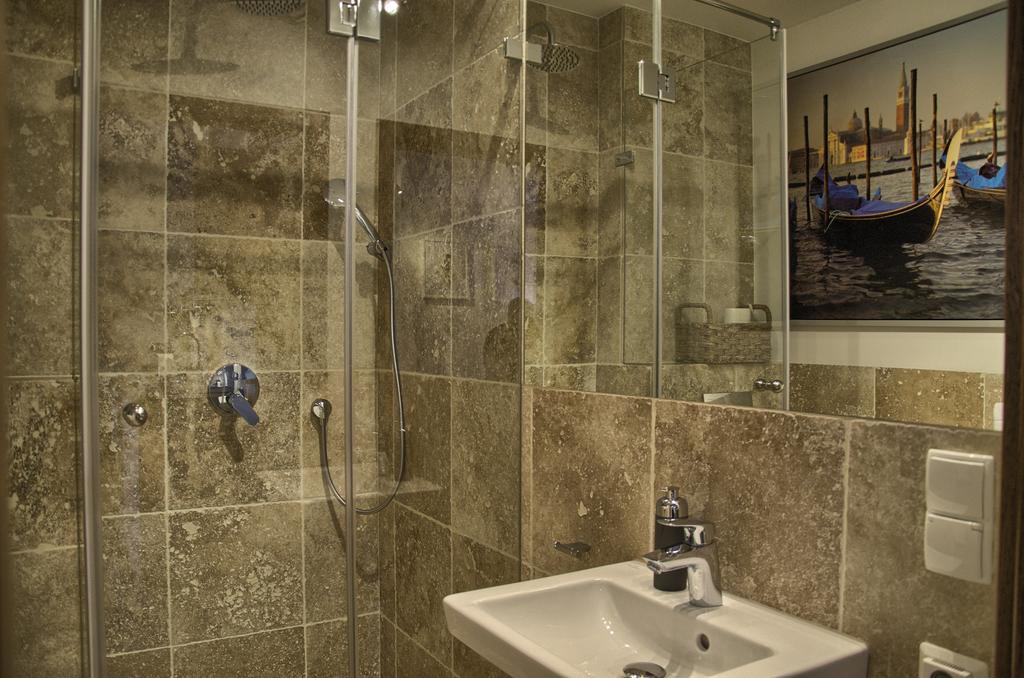 Tartaczna Deluxe Apartments Gdaňsk Pokoj fotografie